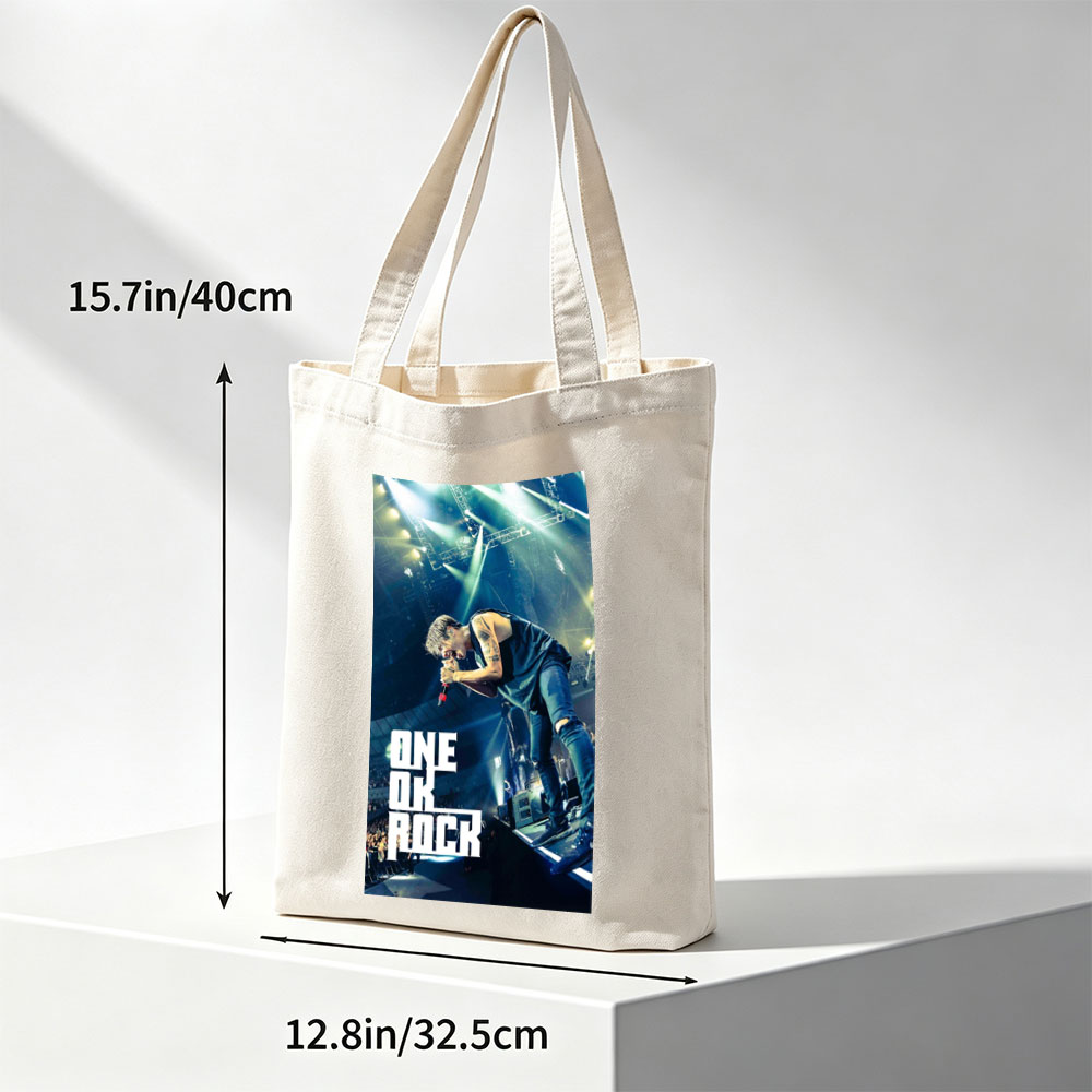 ONE OK ROCK Live Performance on Stage with Dynamic Lighting and Energetic Crowd - Canvas tote bags