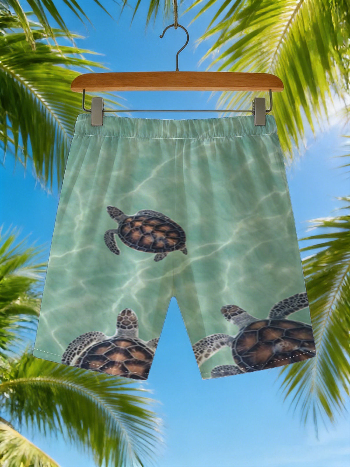 Sea turtles swimming in clear turquoise water -  Beach shorts