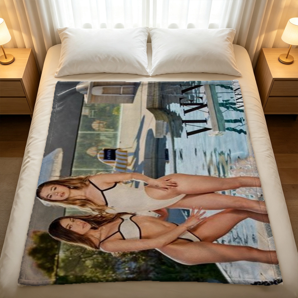 Emily Ratajkowski in black dress on purple bed - Blanket
