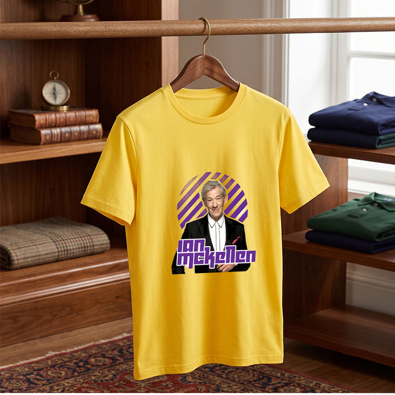 Ian McKellen in a formal suit with a purple and black striped background - Tee