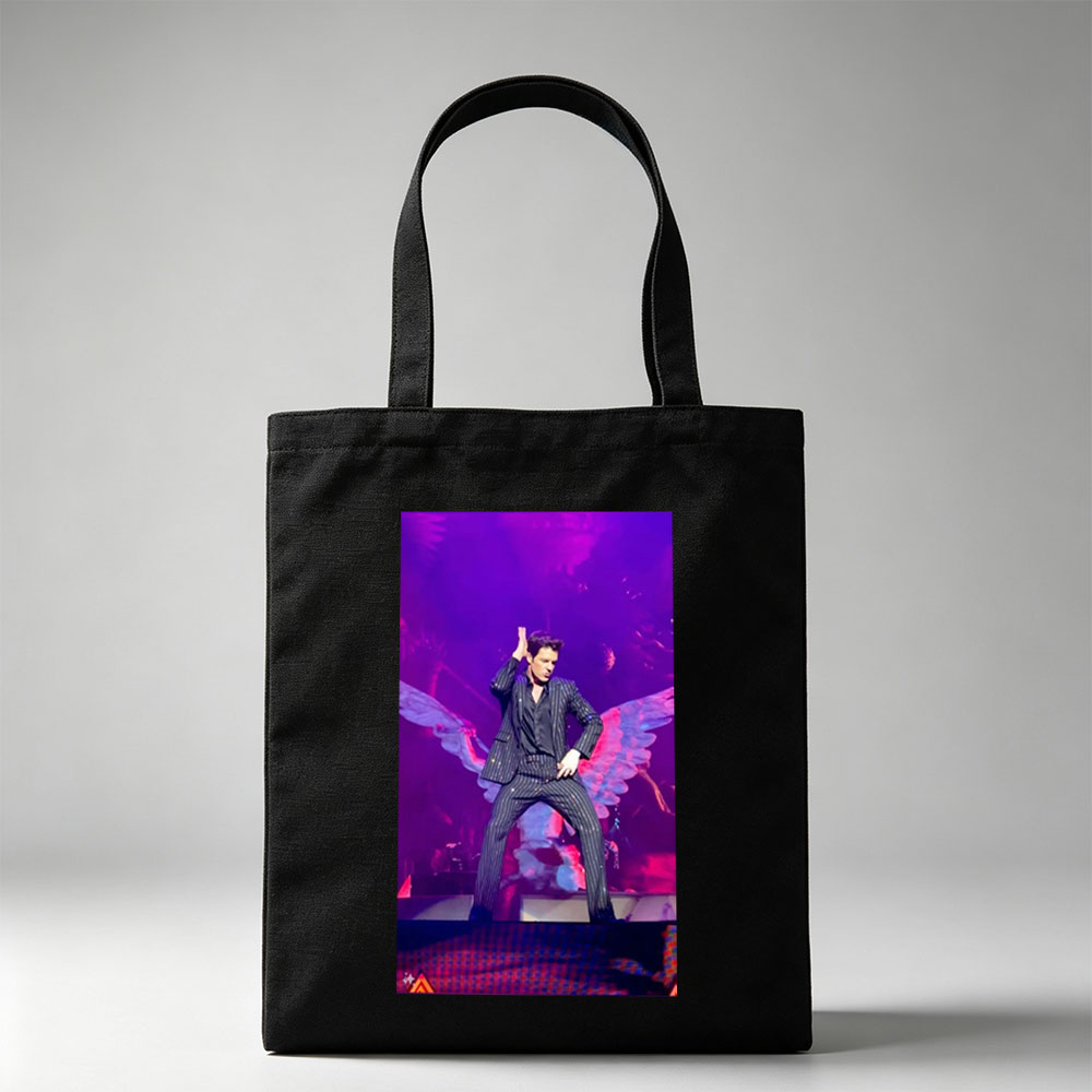 Adam Lambert on Stage in a Striped Suit with Dramatic Wing Props Under Purple Lighting - Canvas tote bags