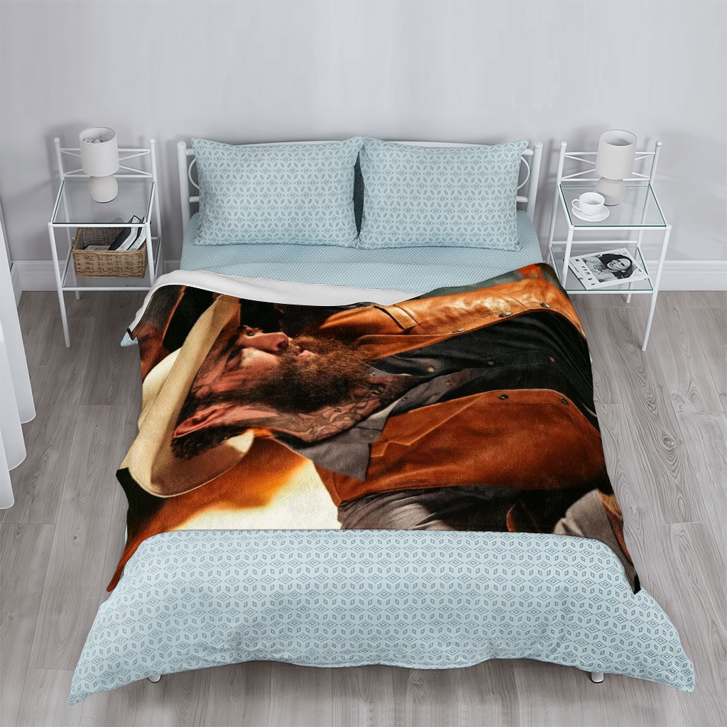 Post Malone in Cowboy Outfit Holding Hat with Fiery Background - Blankets