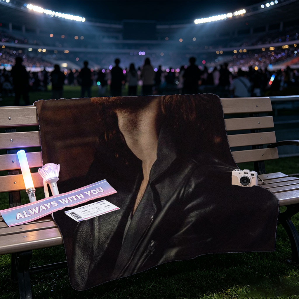 Hozier in a Moody Portrait Wearing a Leather Jacket and Gazing Upward - Blankets