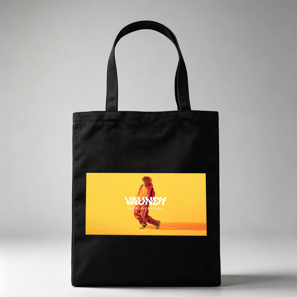 Vaundy in a Vibrant Yellow Studio Setting Wearing Orange Tracksuit and Sneakers - Canvas tote bags