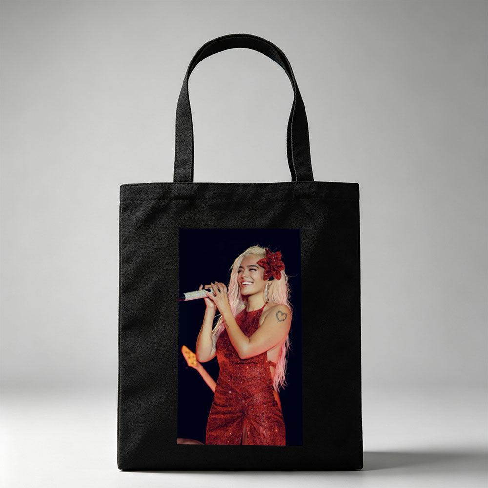 Bebe Rexha Performing on Stage in a Sparkling Red Dress with a Flower Hair Accessory - Canvas tote bags