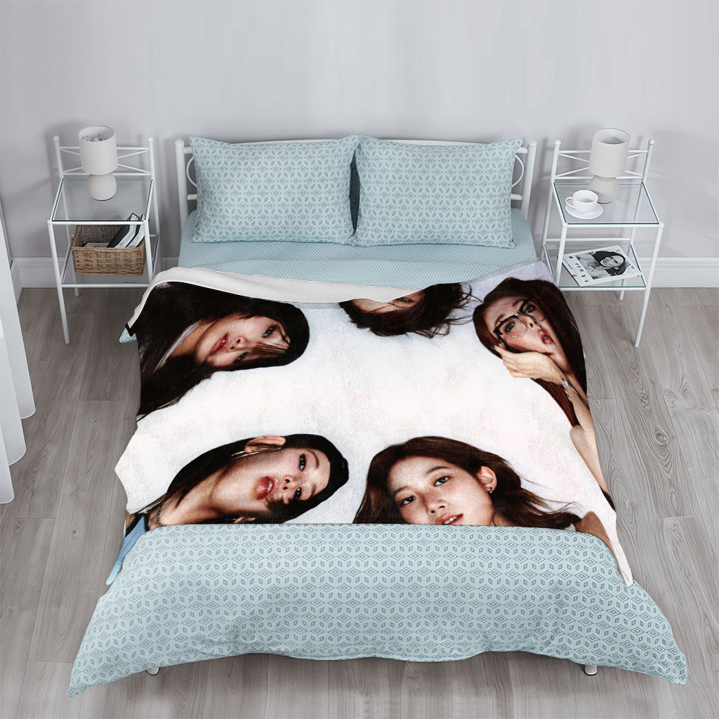 NewJeans Members Lying in a Circle on White Background with Expressive Poses and Fashionable Outfits - Blankets
