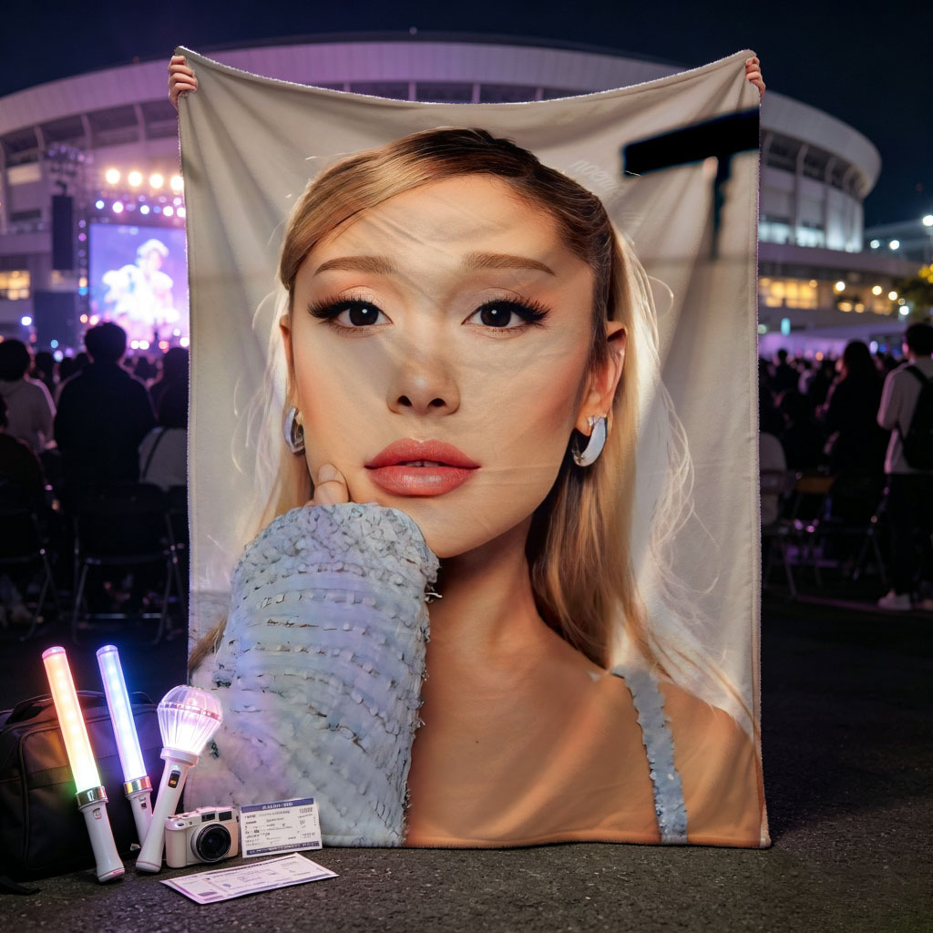 Ariana Grande in a Serene Moment Wearing a Light Blue Textured Top and Elegant Earrings - Blankets