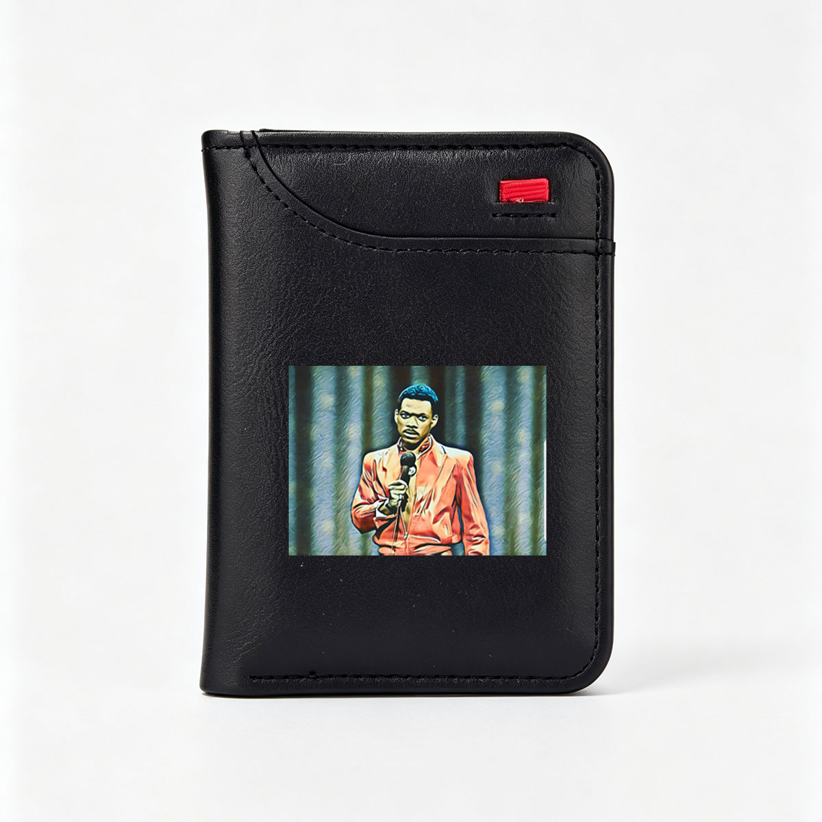 Eddie Murphy in a vibrant orange jacket holding a microphone on stage - Vertical Style Wallet