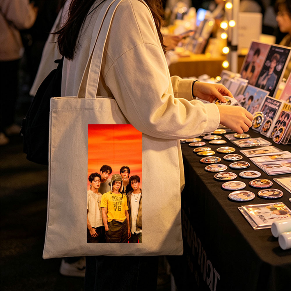 TXT Members in a Bold Group Pose Against a Vibrant Orange Sky Background - Canvas tote bags