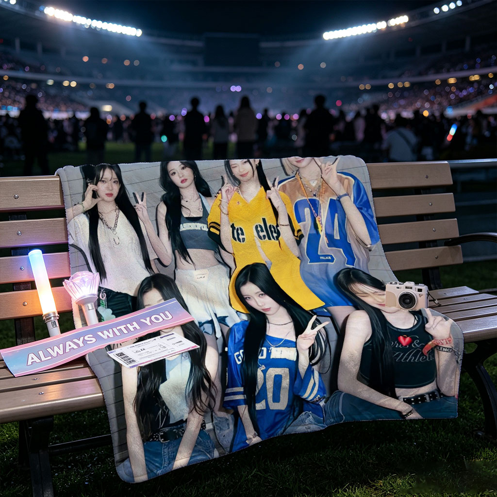 Kep1er Group Photo - Seven Members Posing in Casual Sporty Outfits Against a Gray Wooden Wall - Blankets