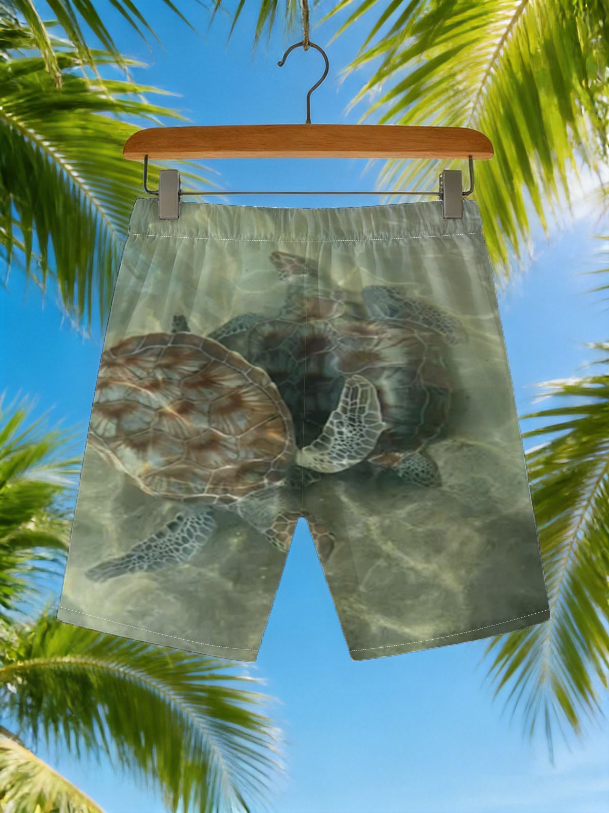 Sea turtles swimming in clear water -  Beach shorts