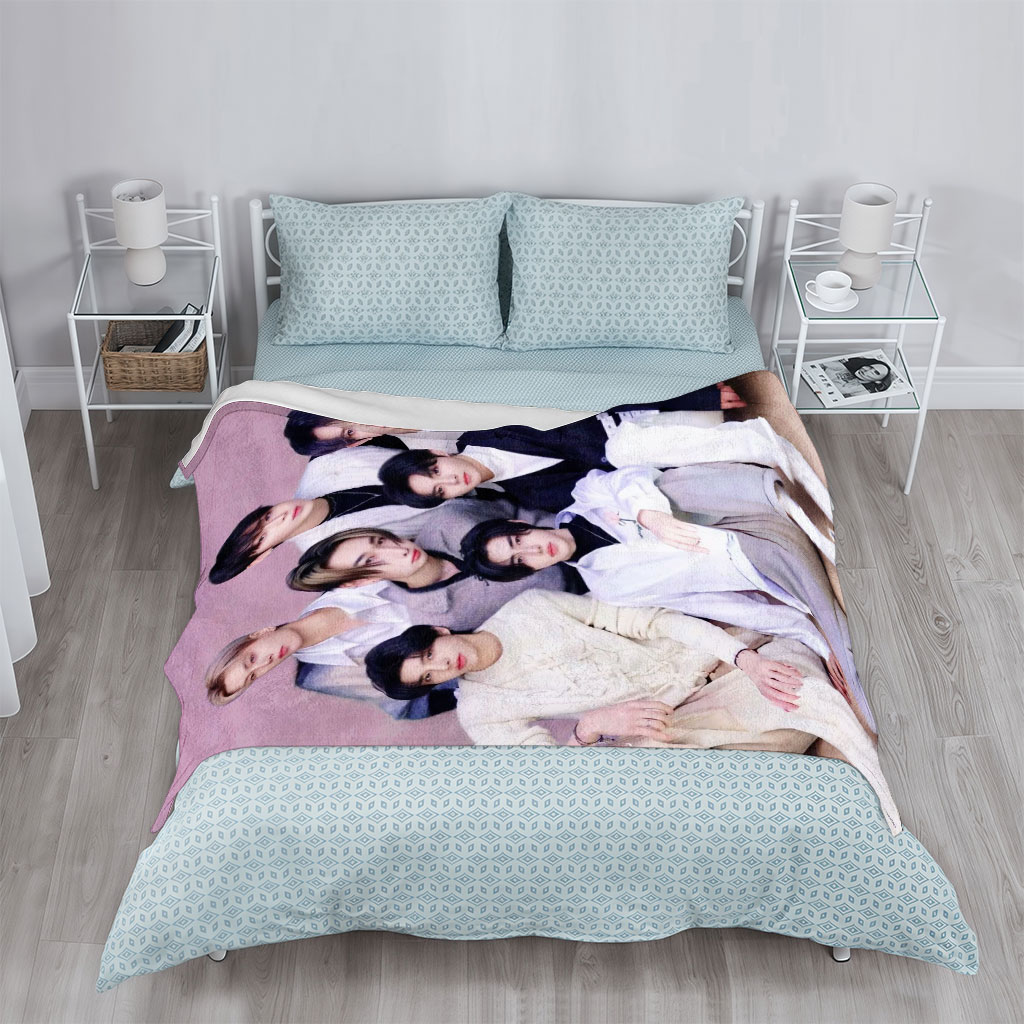 ENHYPEN Group Photo in Stylish Outfits Against Soft Pink Background - Blankets