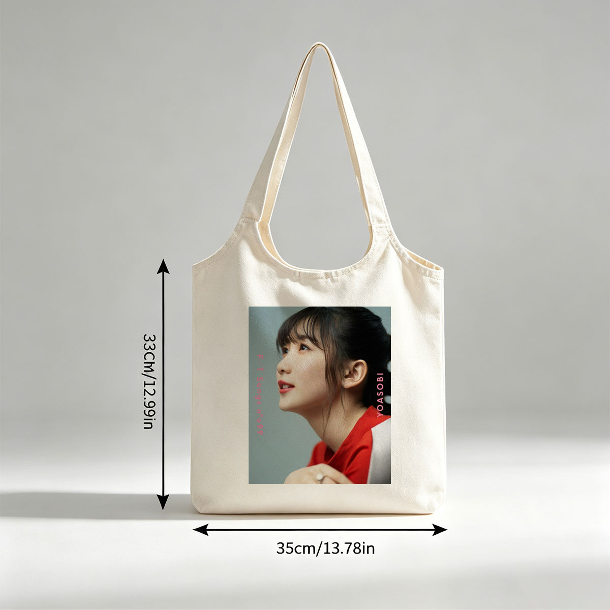 YOASOBI in a Serene Moment with Soft Lighting and Red Outfit - Canvas shoulder bags/