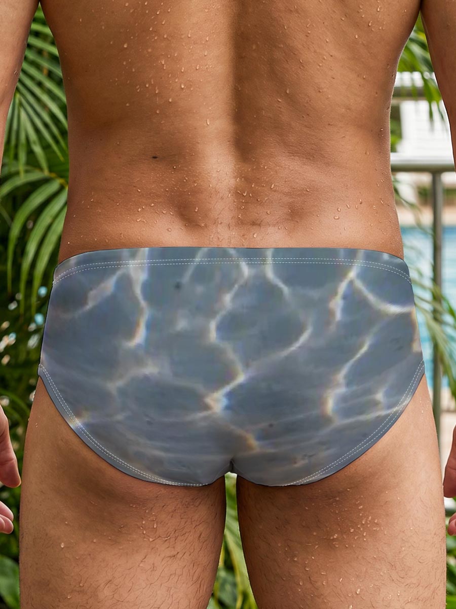 Sea turtle swimming over sandy ocean floor with sunlit ripples -  Men's swim trunks