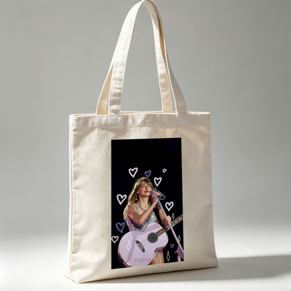 Taylor Swift Performing Live with Acoustic Guitar and Hearts Overlay - Canvas tote bags