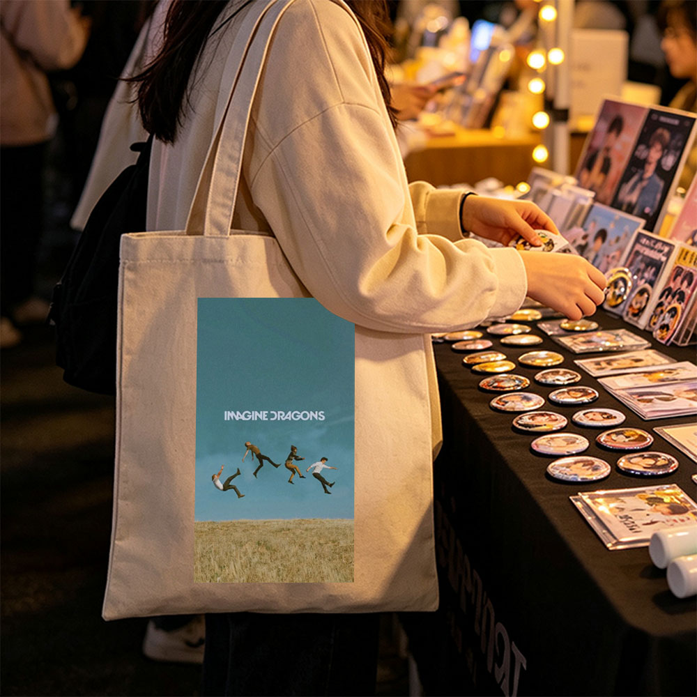 Imagine Dragons Band Members Jumping in a Field Under Blue Sky - Canvas tote bags
