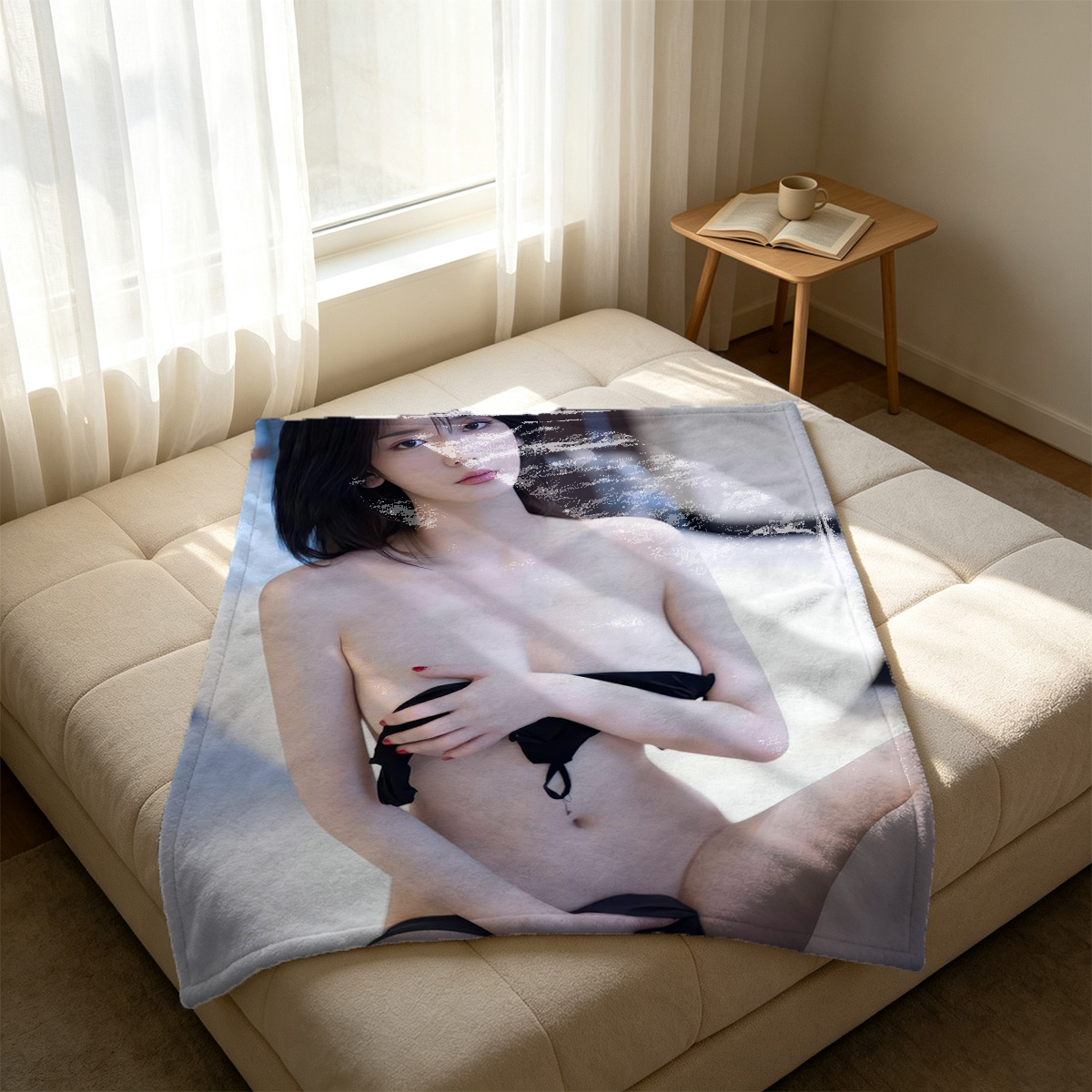 Emma Watson in white thong and black top, kneeling on floor reading magazines. - Blanket