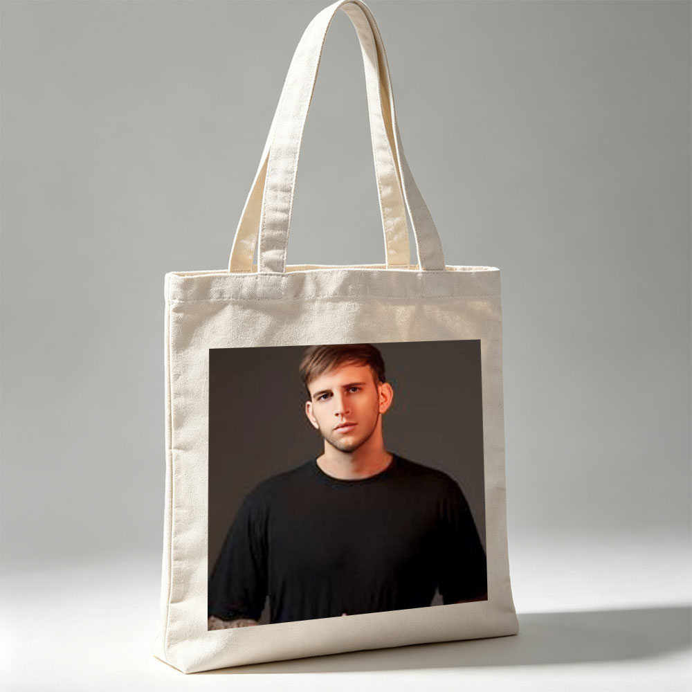 Logan Paul in a Studio Portrait Wearing a Black T-Shirt - Canvas tote bags