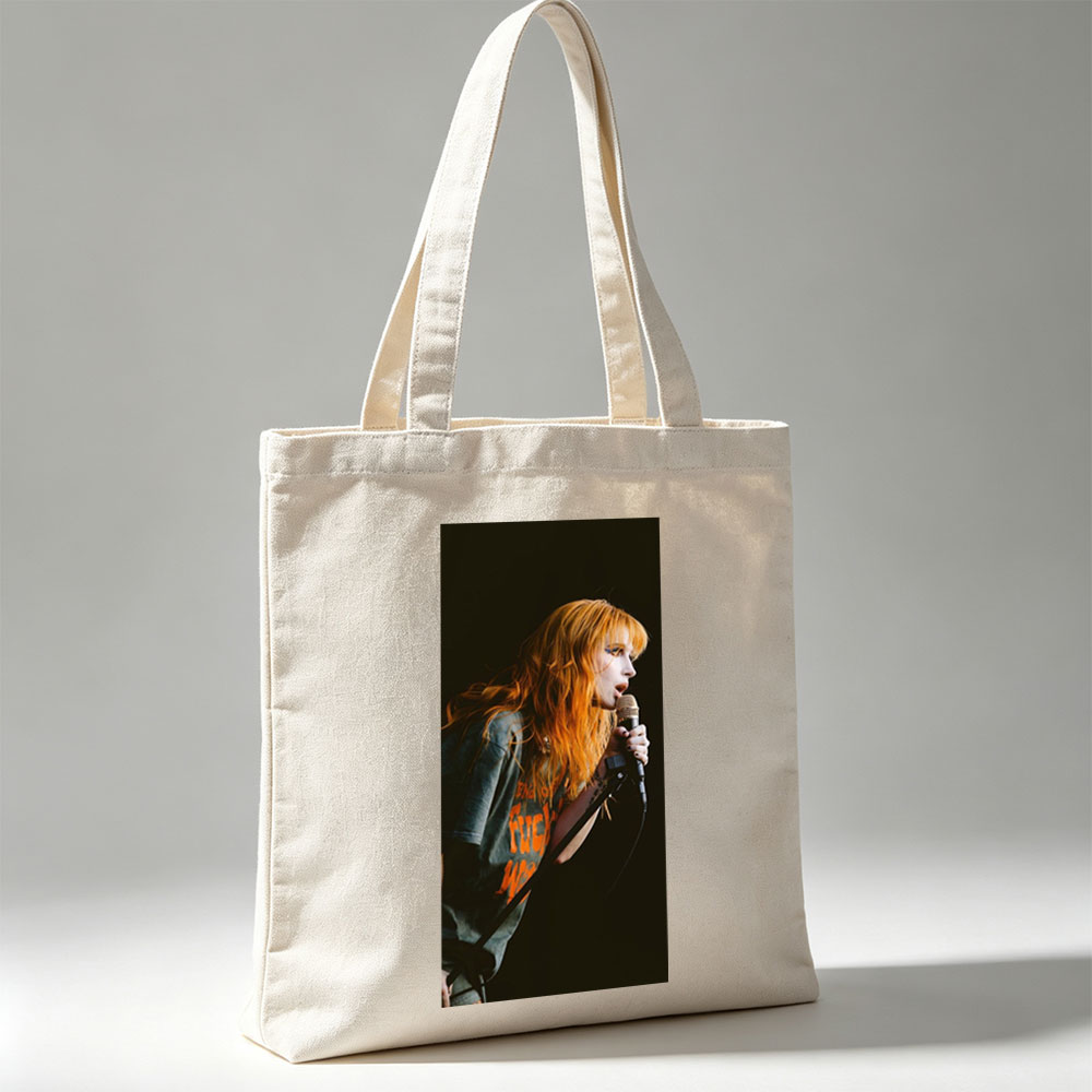 Paramore's Hayley Williams Performing on Stage with Microphone in Hand - Canvas tote bags