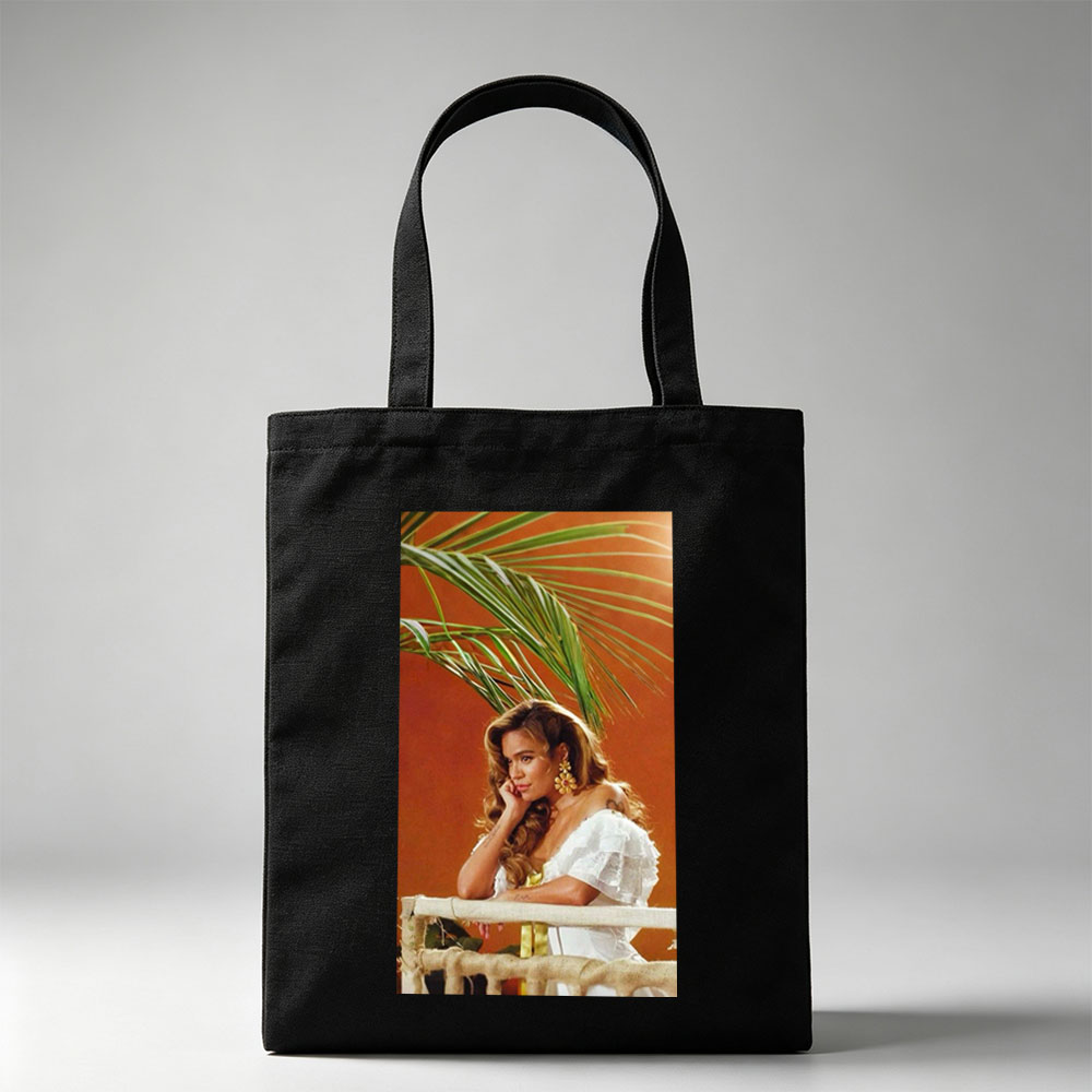 Maren Morris in a Tropical Scene Wearing a White Ruffled Dress with Palm Leaves in the Background - Canvas tote bags