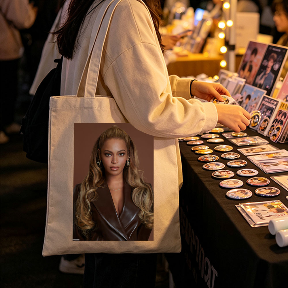 Beyonce in a Bold Brown Leather Look with Elegant Waves and Gold Jewelry - Canvas tote bags
