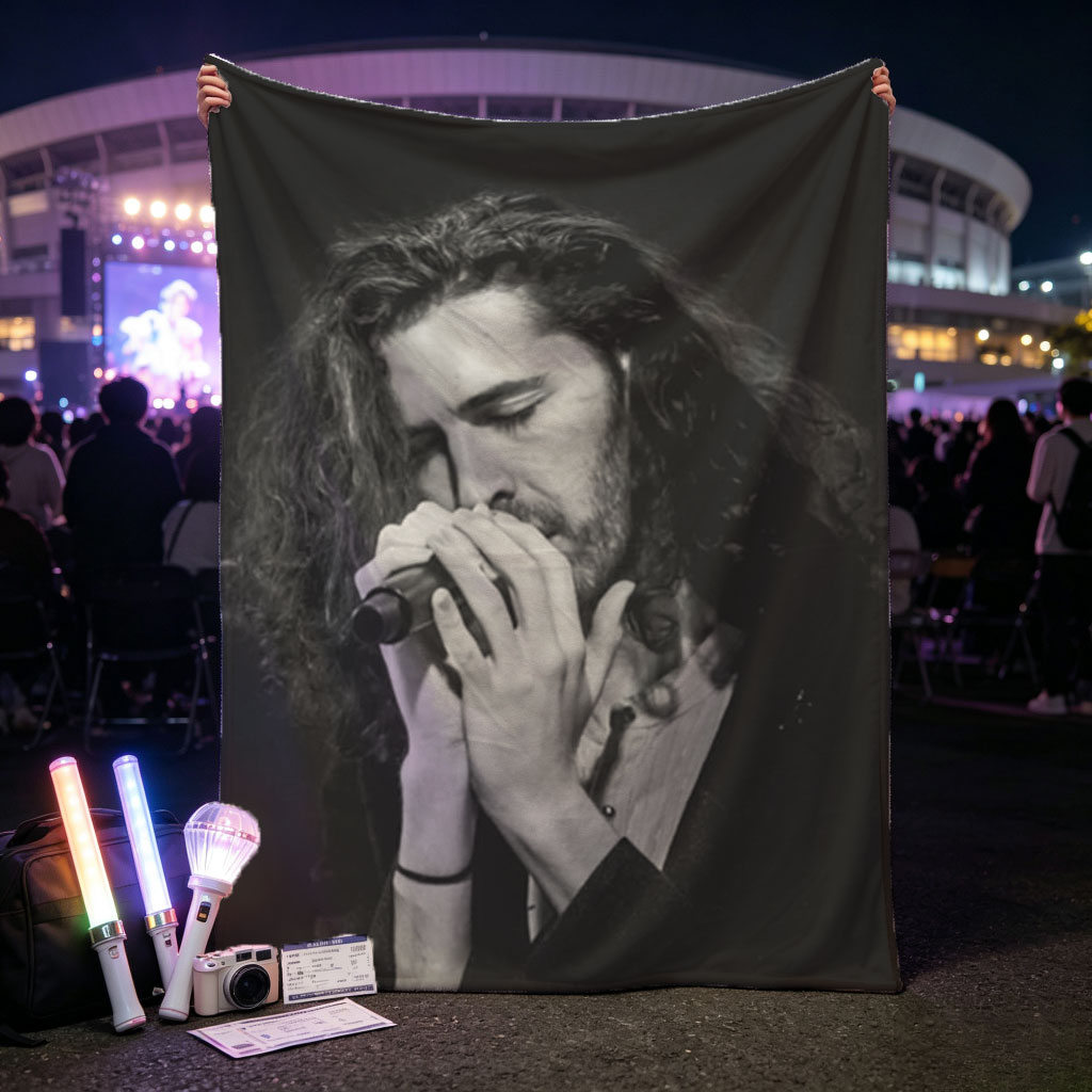 Hozier Performing on Stage Holding Microphone in Black and White - Blankets