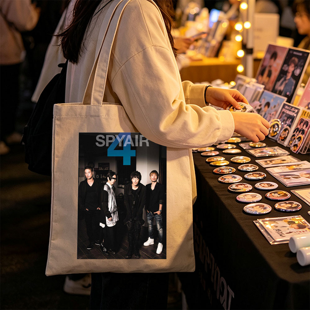 SPYAIR Band Members Standing in a Dimly Lit Room with Bold Number 4 and Band Name Overlay - Canvas tote bags