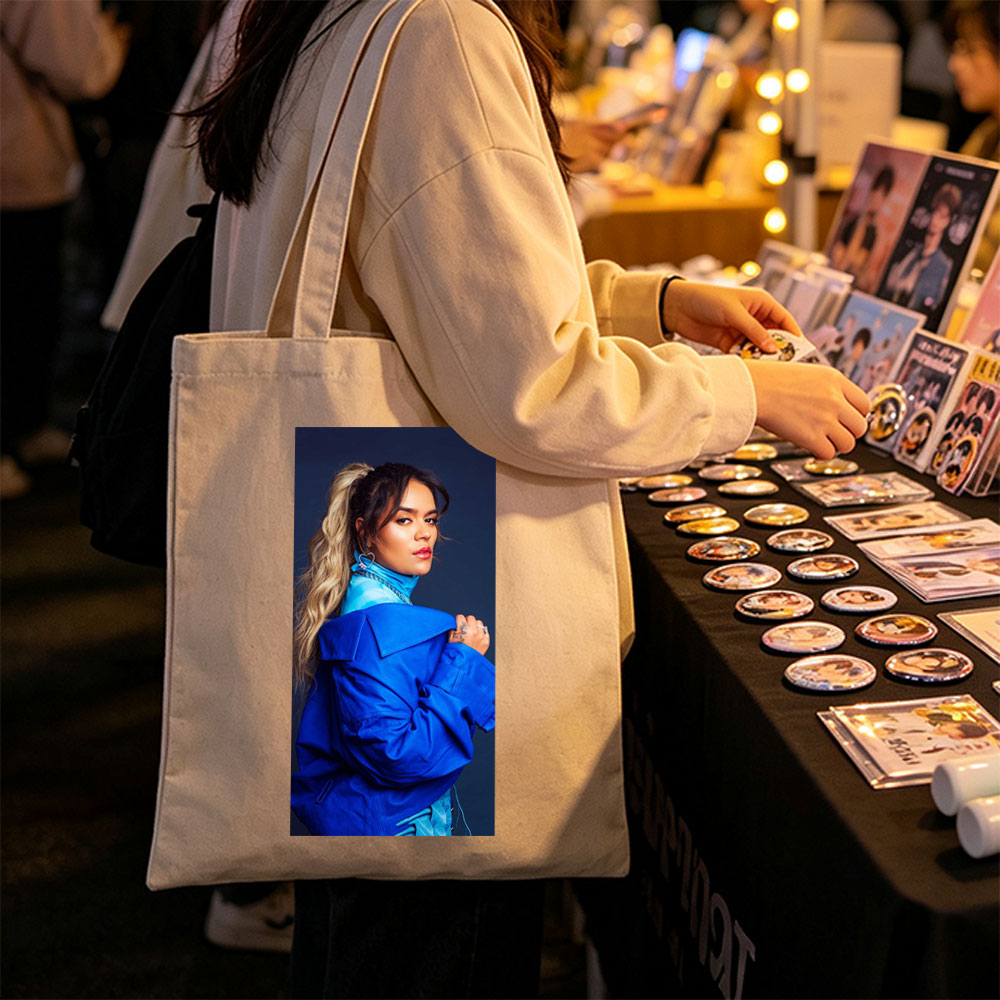Rita Ora in Bold Blue Fashion Pose Against Dark Background - Canvas tote bags
