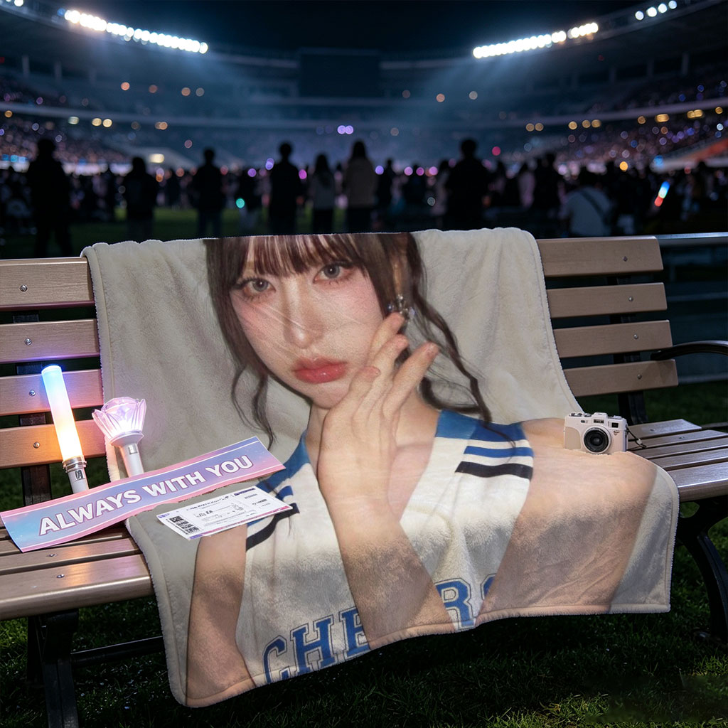 K-pop Idol in Cheerleader Outfit Poses with Hand on Face Against Gray Background - Blankets