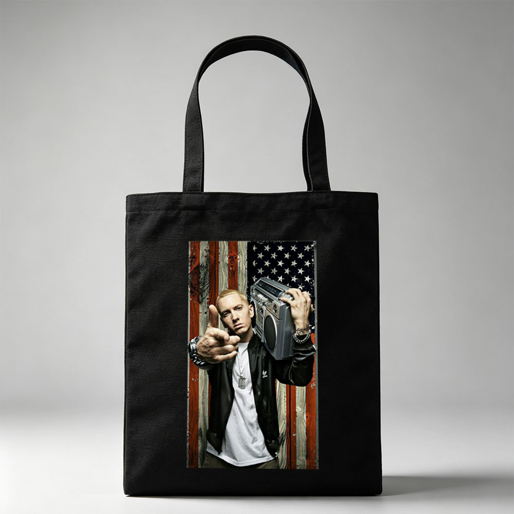 Eminem Holding Boombox Pointing at Camera Against American Flag Background - Canvas tote bags
