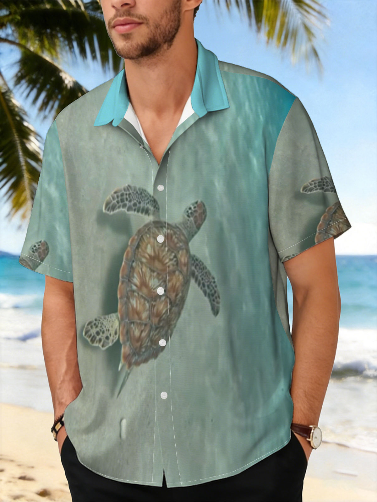 Sea turtle swimming gracefully over sandy ocean floor -  Shirt