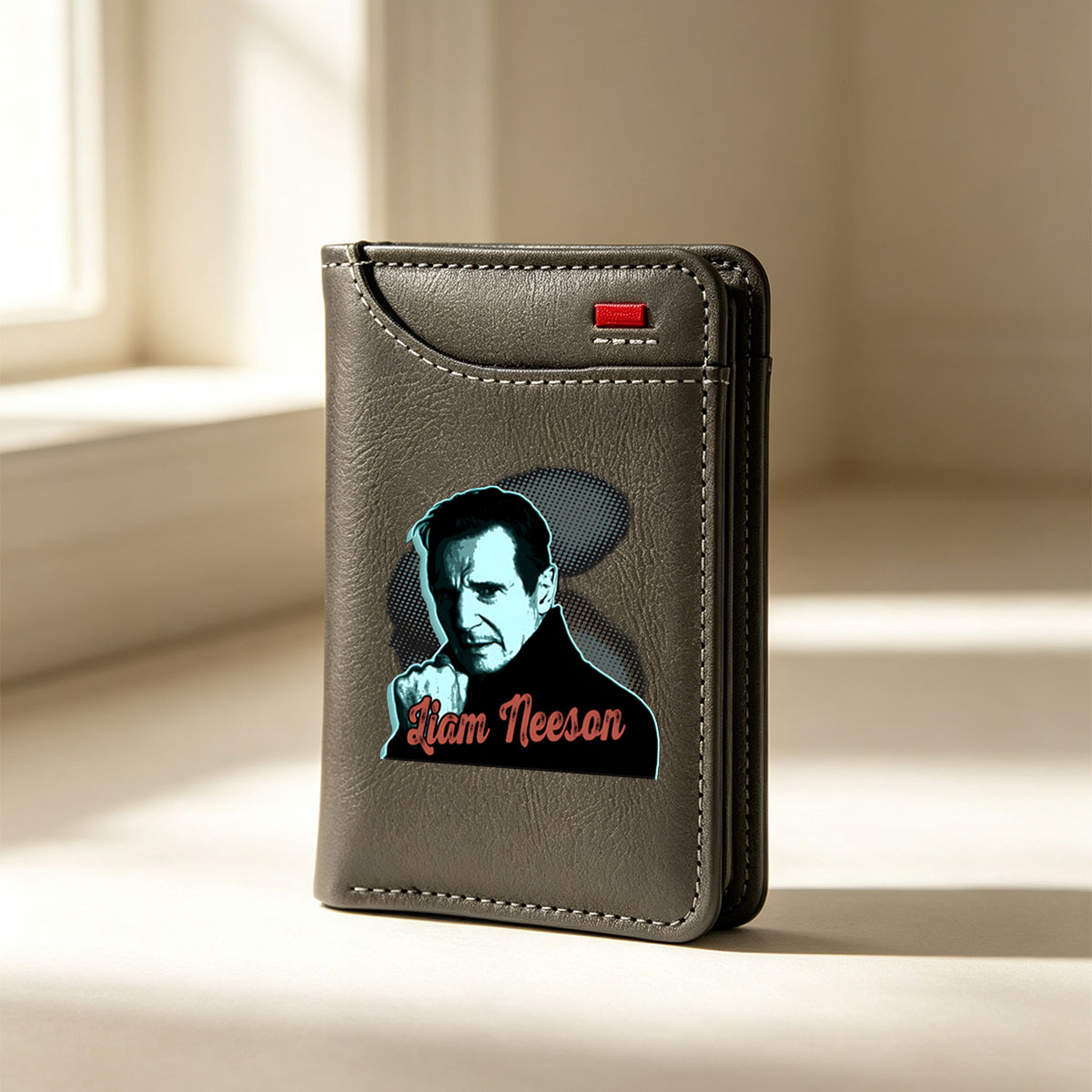 Liam Neeson in a dramatic pose with bold text and graphic design elements - Vertical Style Wallet