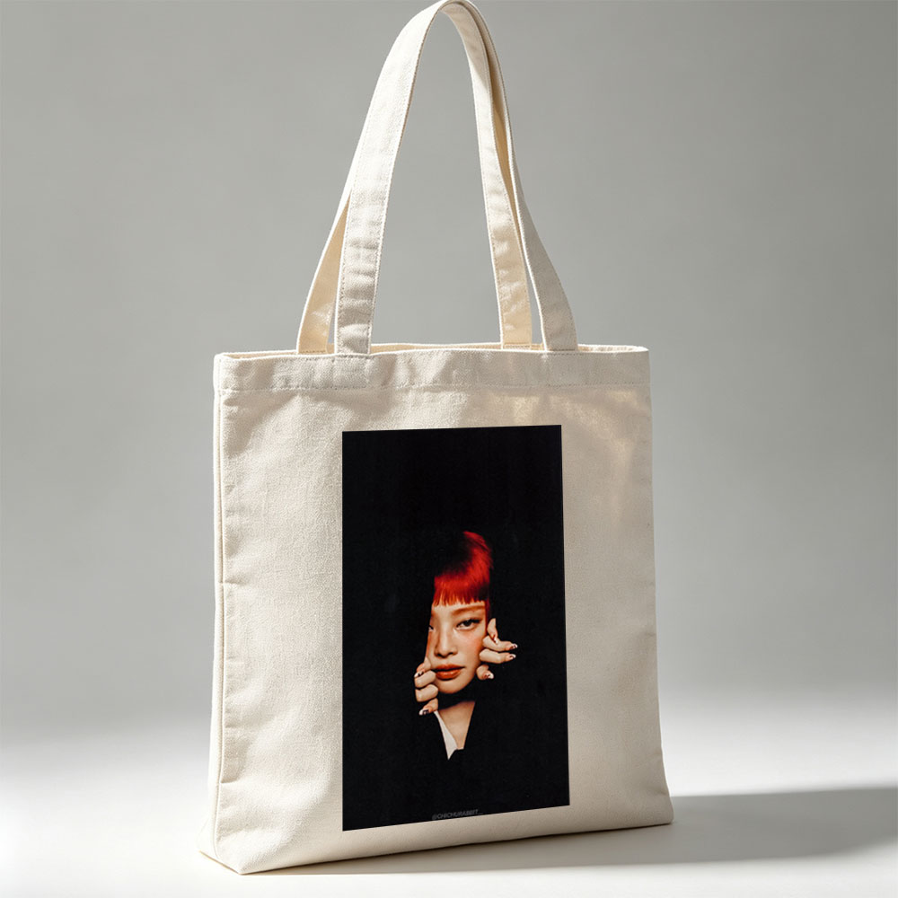 Rihanna in Dramatic Portrait with Red Hair and Bold Makeup - Canvas tote bags