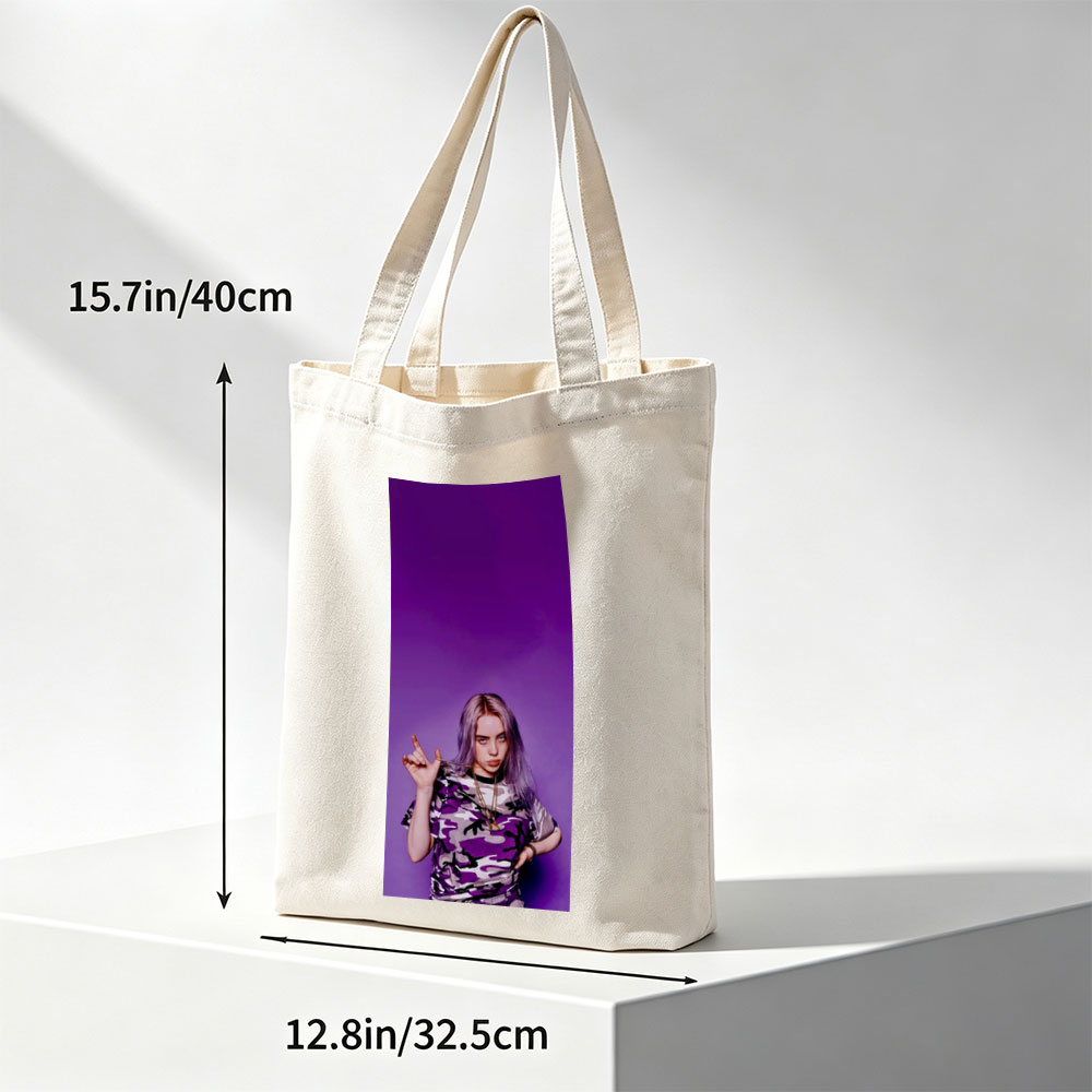 Billie Eilish in Purple Camo Outfit Making Hand Gesture Against Vibrant Background - Canvas tote bags