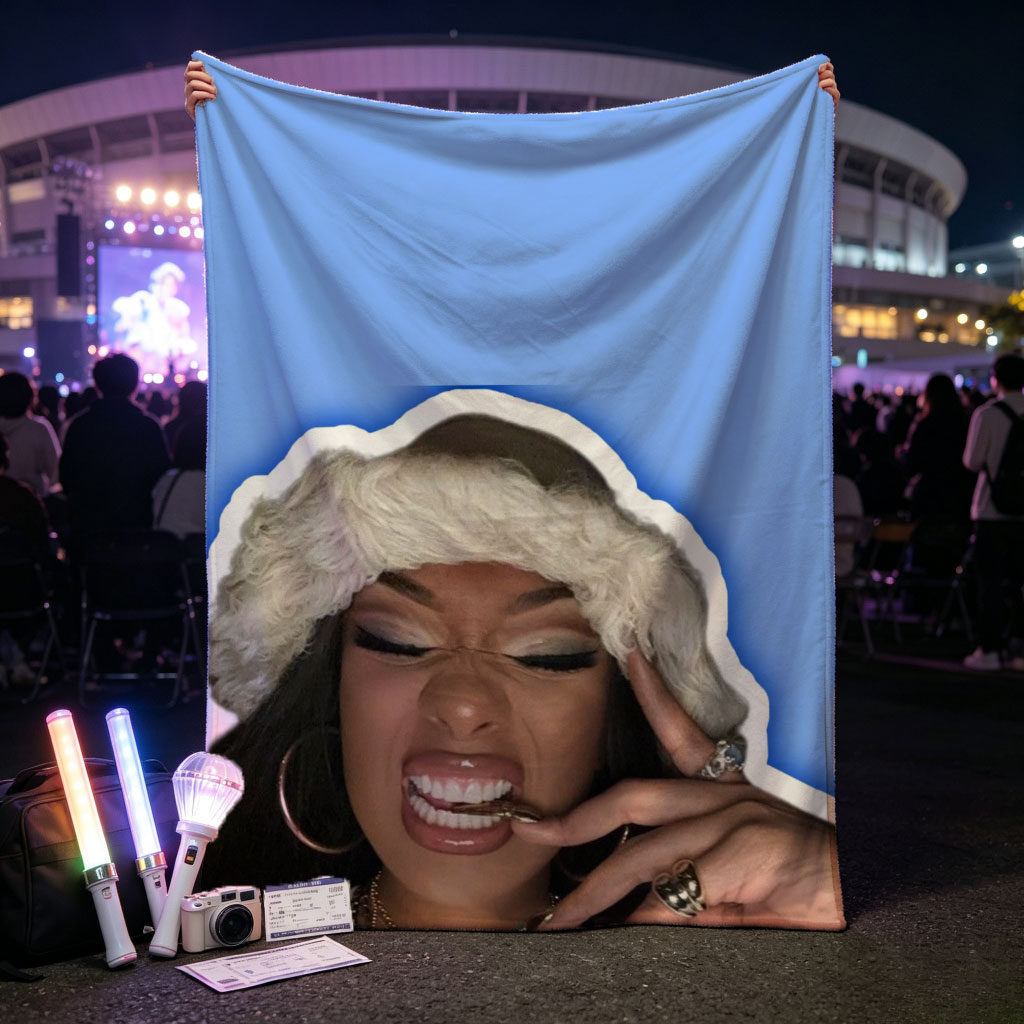 Doja Cat in Festive Mood Wearing Fur Hat and Gold Jewelry Against Blue Background - Blankets