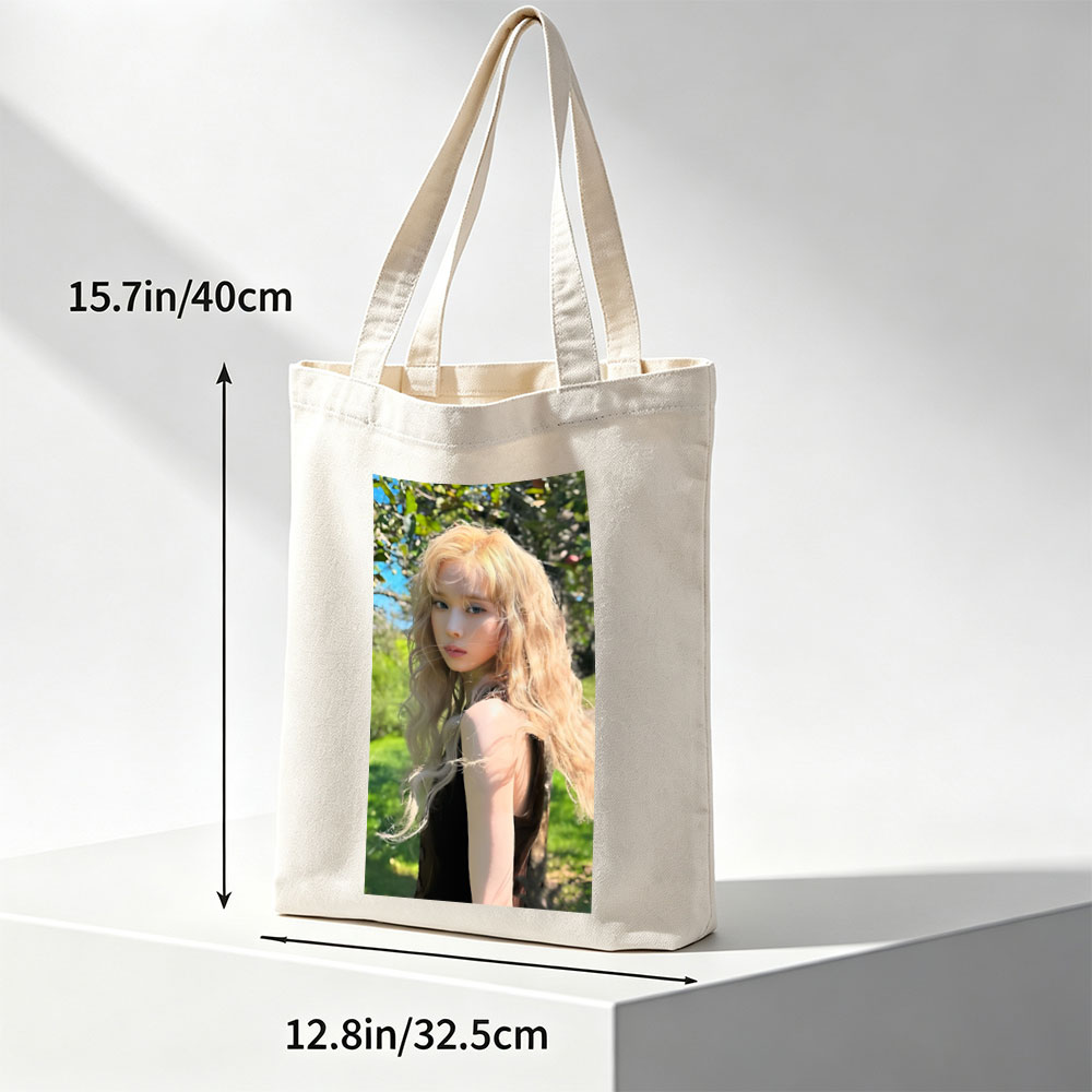 Kim Yoo Jung in a Sunlit Garden with Flowing Blonde Hair and Elegant Black Dress - Canvas tote bags
