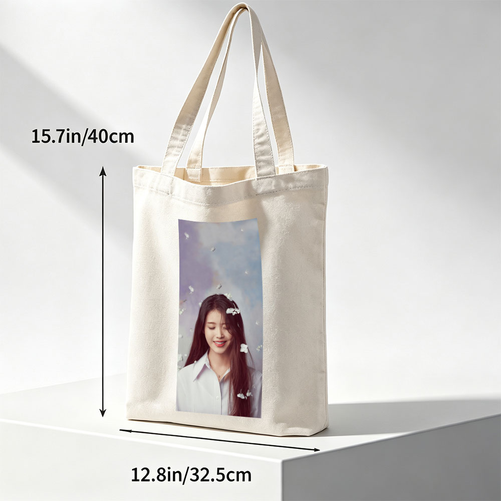 IU in a Dreamy Floral Scene with White Flowers Floating Around Her - Canvas tote bags