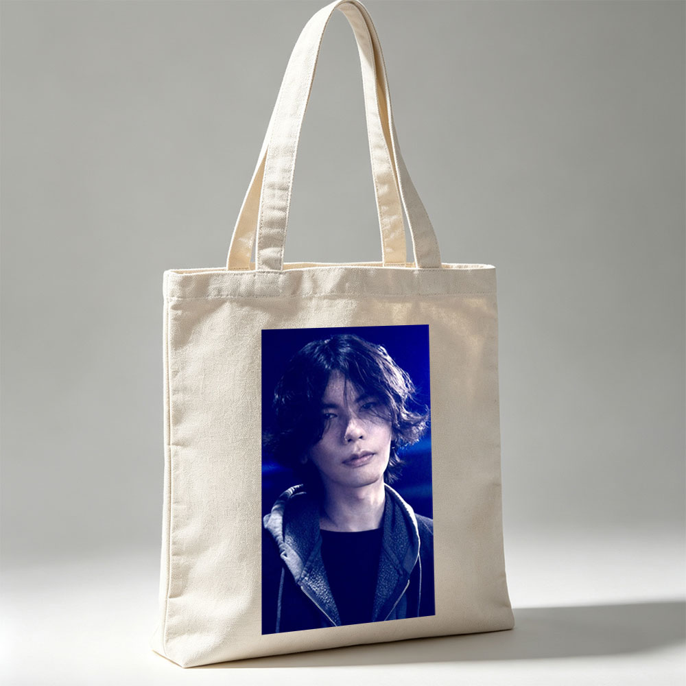 Yosuke Nagai in a dramatic scene with intense blue lighting and a stylish jacket - Canvas tote bags