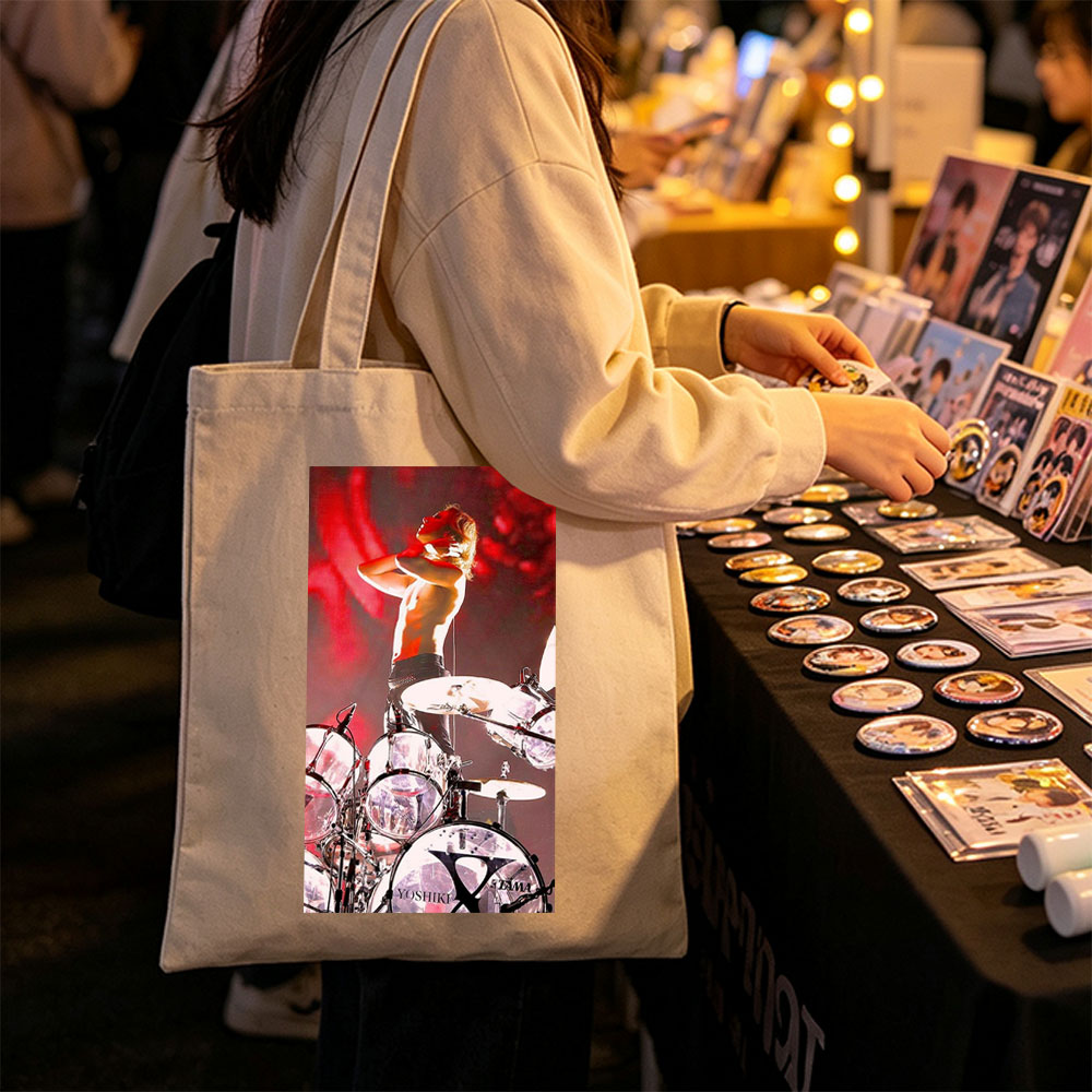 Yoshiki of X Japan on Stage Performing with Drum Set in Intense Red Lighting - Canvas tote bags