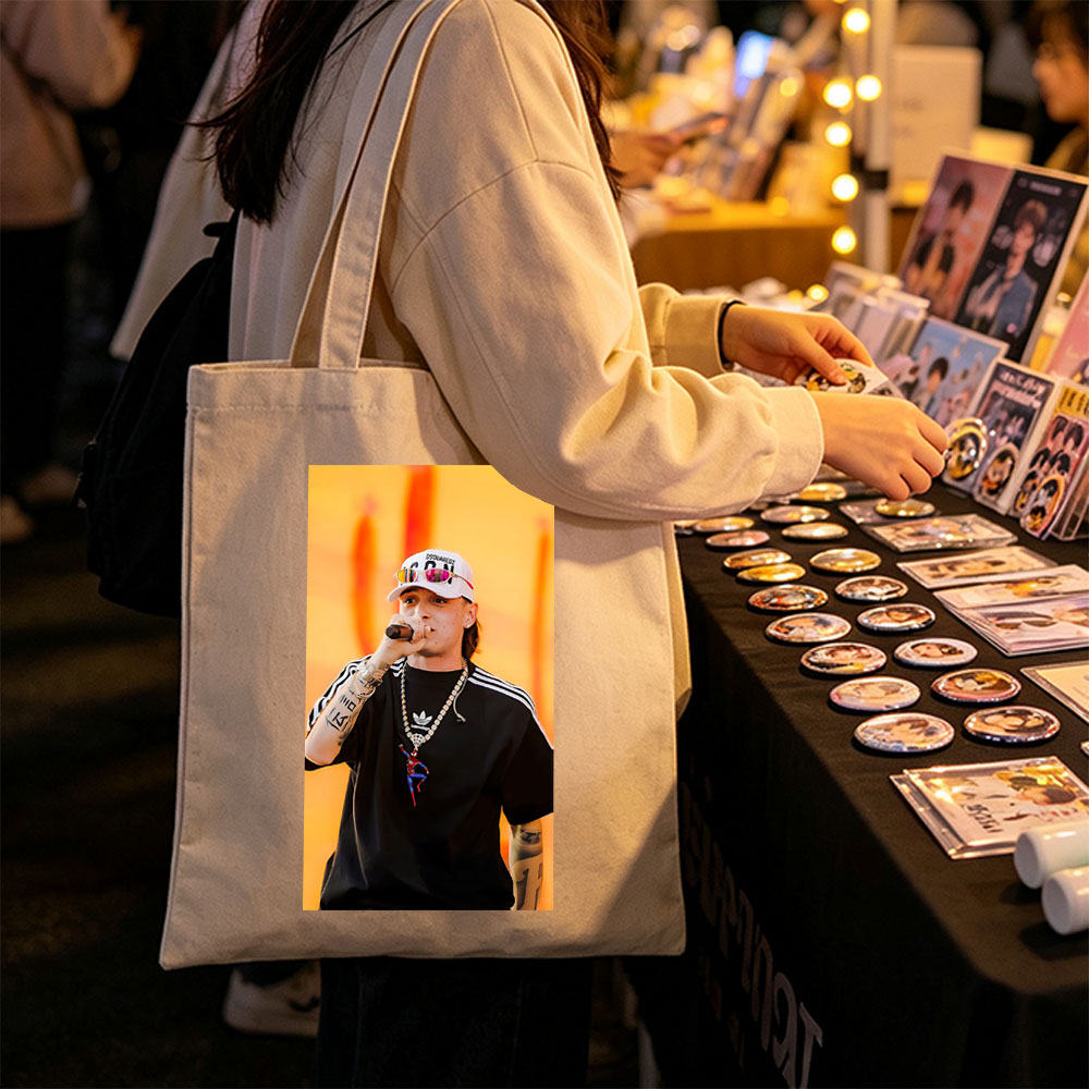 Machine Gun Kelly Performing on Stage Wearing a DSQUARED2 Cap and Spider-Man Pendant Necklace - Canvas tote bags