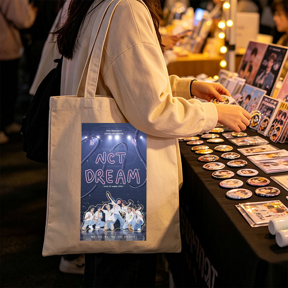 NCT DREAM on Stage Performance in Vibrant Group Photo with Cosmic Background - Canvas tote bags