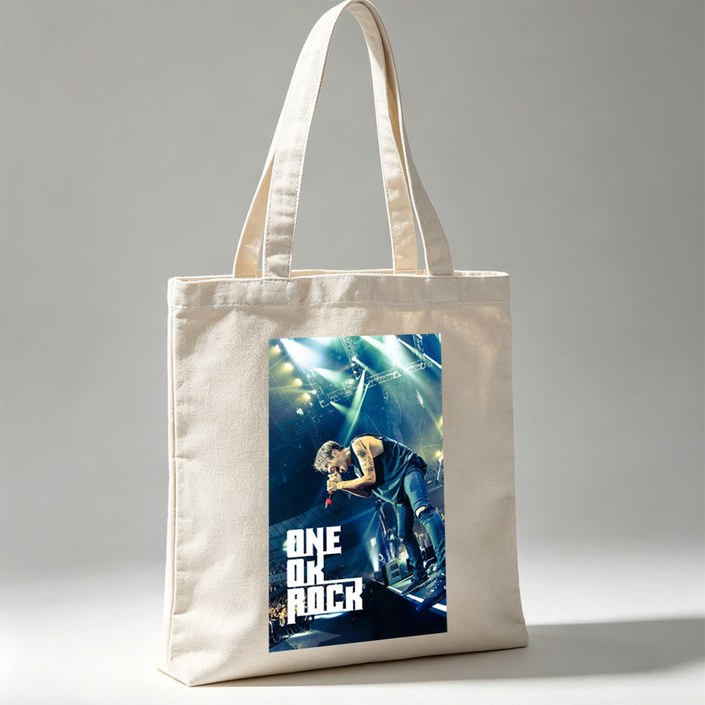ONE OK ROCK Live Performance on Stage with Dynamic Lighting and Energetic Crowd - Canvas tote bags