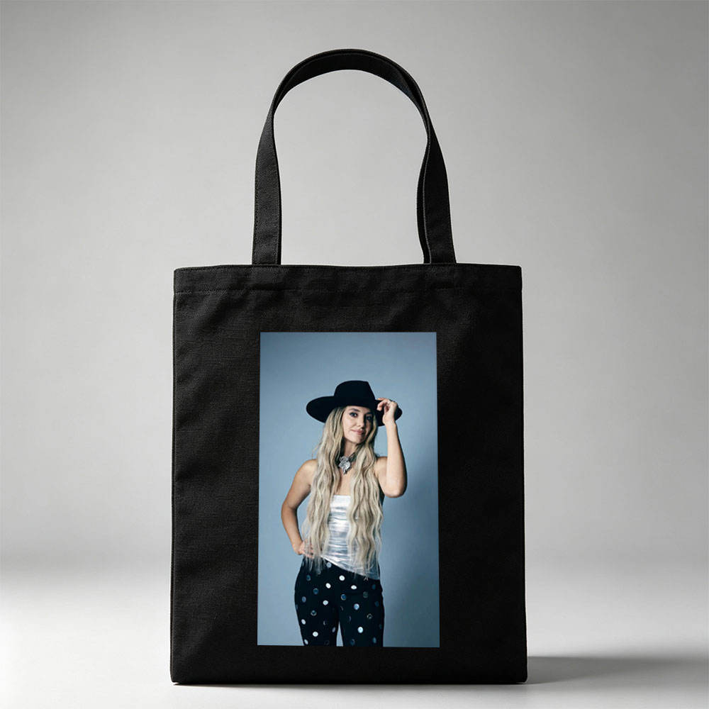 Shania Twain in a Stylish Pose Wearing a Black Hat and Polka Dot Pants - Canvas tote bags