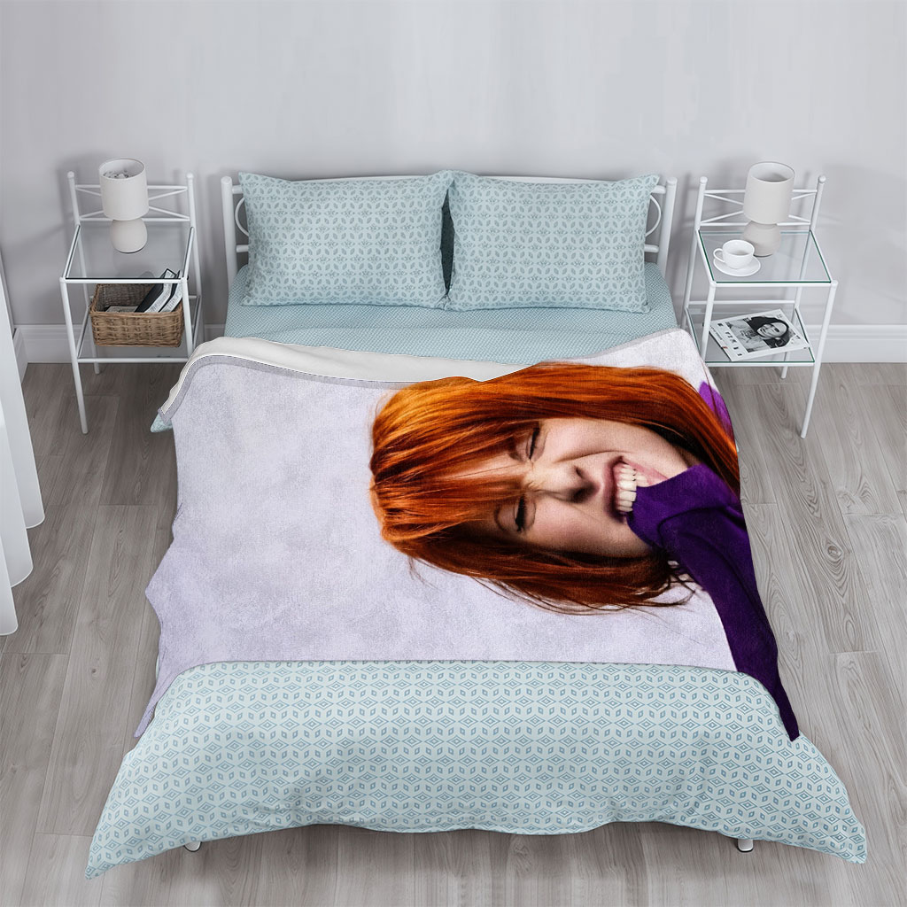 Hayley Williams from Paramore in a Playful Pose Wearing a Purple Nashville Shirt with a Vibrant Design - Blankets
