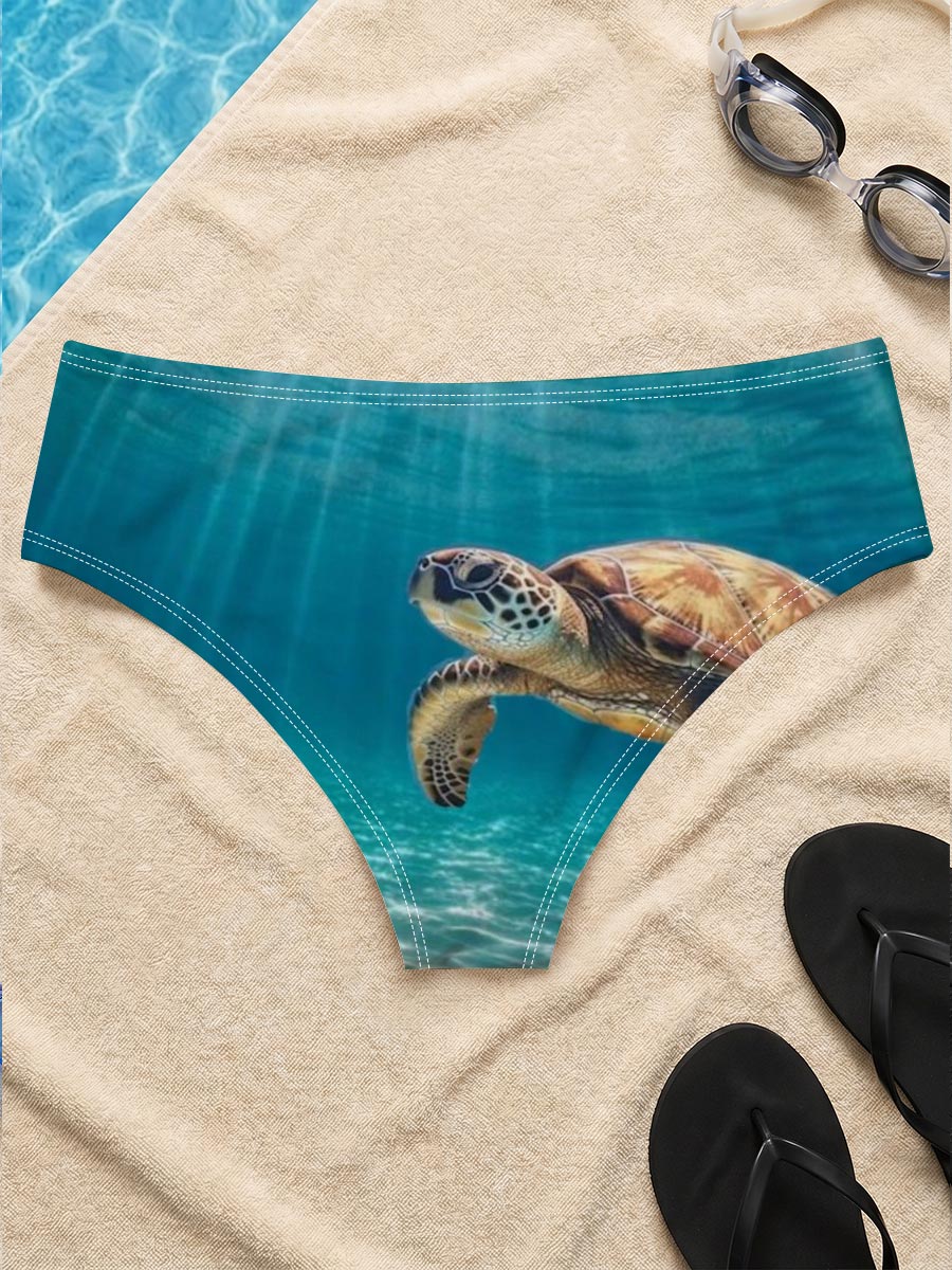 Sea turtle glides through sunlit waters, rays shimmering above. -  Men's swim trunks