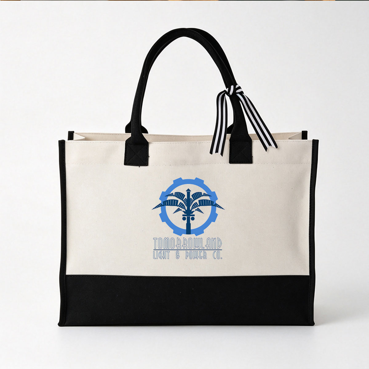 Tomorrowland Light & Power Co. Logo Featuring a Palm Tree and Gear Design - Canvas patchwork gift tote bag