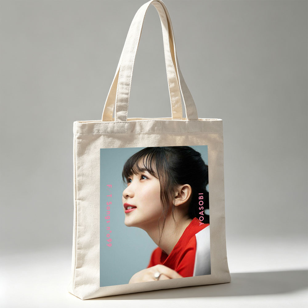 YOASOBI in a Serene Moment with Soft Lighting and Red Outfit - Canvas tote bags