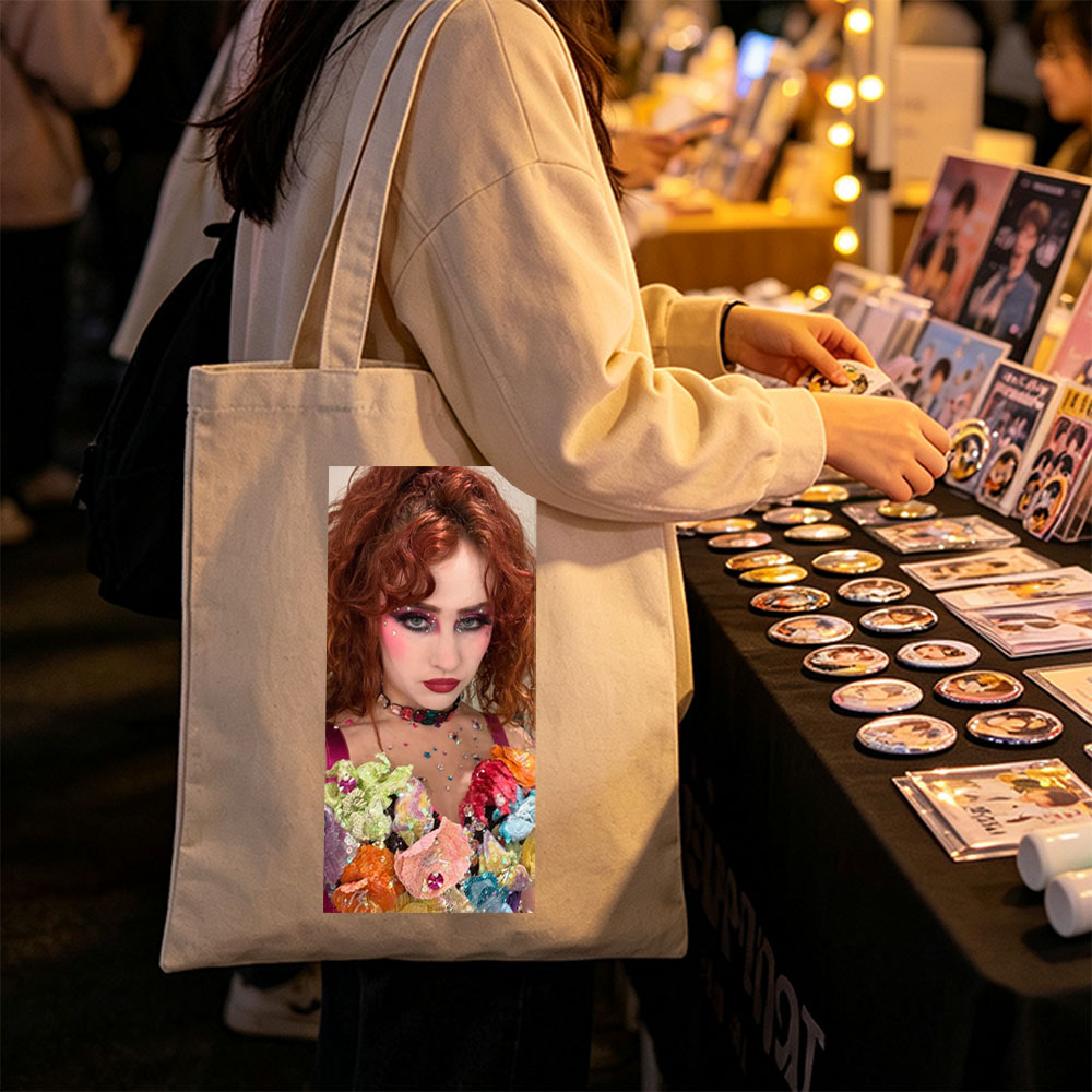Chloe Lukasiak in a Vibrant Fashion Scene Featuring Colorful Floral Outfit and Dramatic Makeup - Canvas tote bags