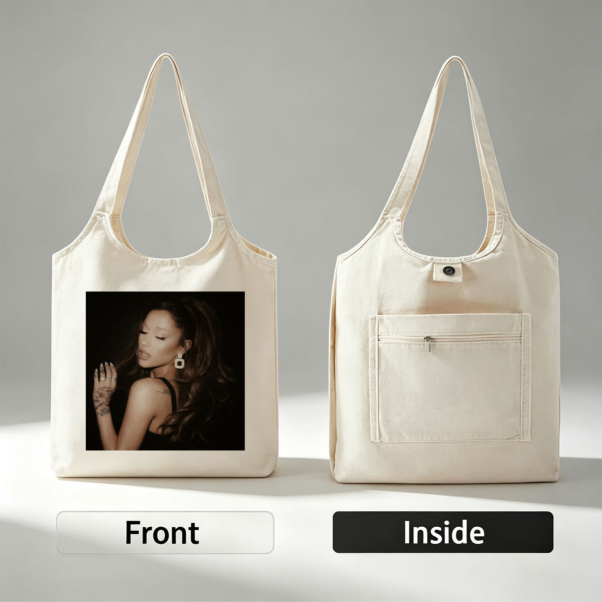 Ariana Grande in a Dramatic Pose with Long Hair and Tattoos on Dark Background - Canvas shoulder bags/