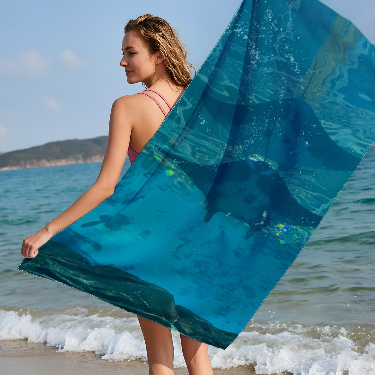 Graceful manta rays glide through clear blue waters, their silhouettes dancing beneath the surface. - Beach towels